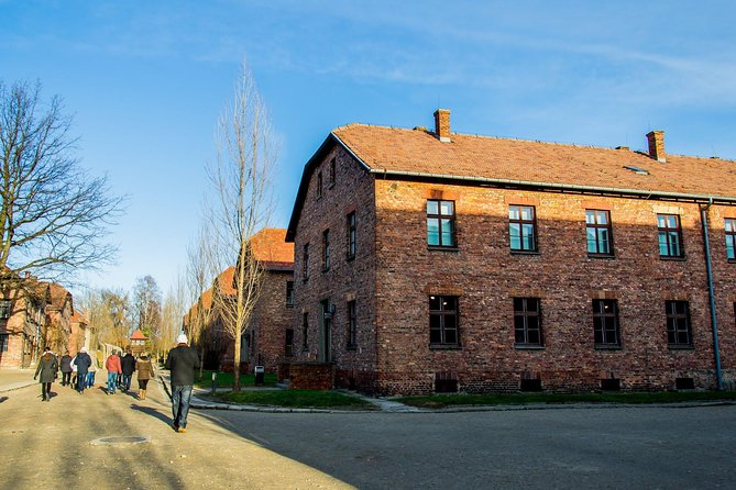 Auschwitz Birkenau Guided Tour with Ticket Hotel Pickup Small Van - Why the headphones and official guide matter