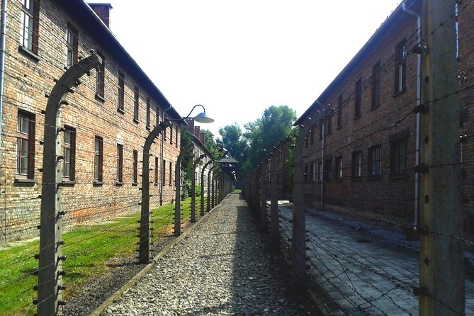 Auschwitz-Birkenau Self-Guided Visit from Krakow with Private Transfers - Auschwitz II-Birkenau: the ramp, barracks, and ruins