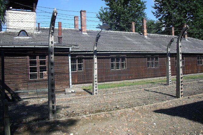 Auschwitz Tours Memorial and Museum Guided Tour from Krakow - What the $74.65 price really covers