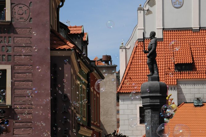 Discover Poznan: Walk, Take a tram and have a traditional snack - Fara Church and the odd details inside