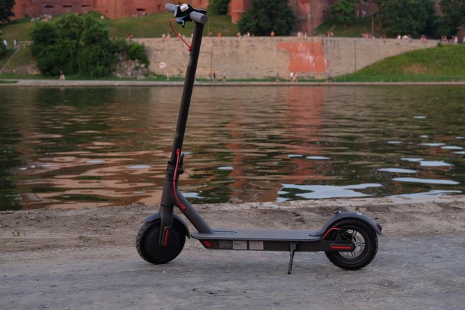 E-Scooter Krakow sightseeing tour - Crossing Rynek Glowny, Krakow’s great public square