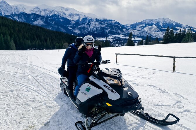 Full day Tour Zakopane Snowmobiles Thermal Baths from Krakow - Oscypek, fire, and a cup of mulled wine