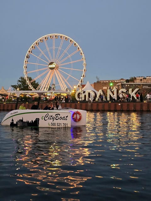 Gdańsk: Motława River Eco Cruise at Sunset with Prosecco - Old town water gates and the red crane
