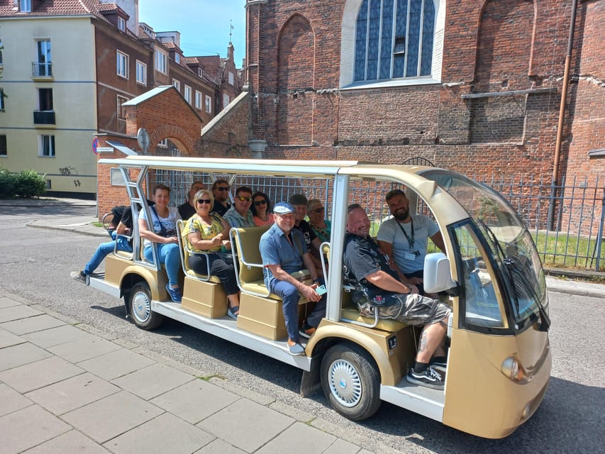 Gdansk: Private Top City Tour by Electric Cart & Live Guided - Old City Hall, market halls, and the ride back