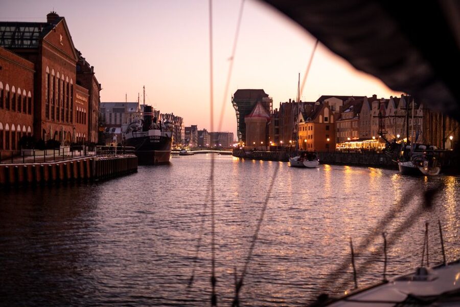 Gdańsk: Scenic Sunset Cruise with Welcome Drink - Passing Stadion Energa Gdańsk and the outer port