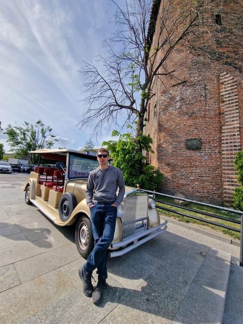 Gdansk: Shared or Private City Tour Sightseeing By Golf Cart - Gdańsk Main Station and the final churches