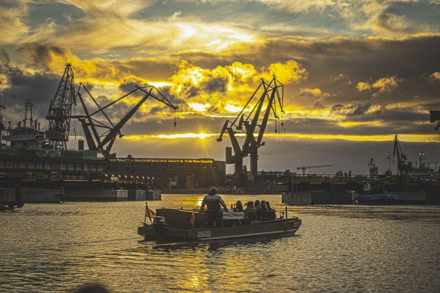 Gdańsk: Sunset Cruise on a Historic Polish Boat - The famous cranes and the city after dark