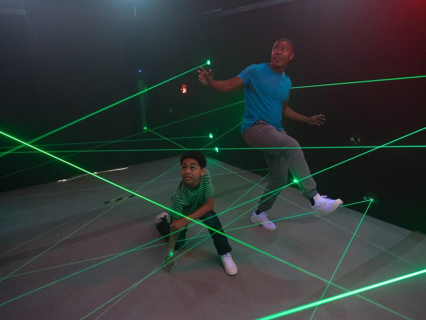 Krakow: 4 Mazes and Living Butterfly Museum Entry Ticket - Crawling under beams in the Laser Maze