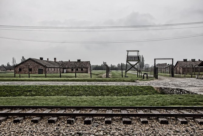 Krakow: Auschwitz-Birkenau Guided Tour with Hotel Transfer - Auschwitz II-Birkenau: Scale, Open Ground, and Weather