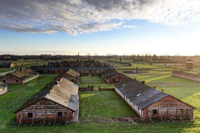 Krakow: Auschwitz-Birkenau & Salt Mine OneDay Tour (hotel pickup) - Birkenau: scale, silence, and the railway platform