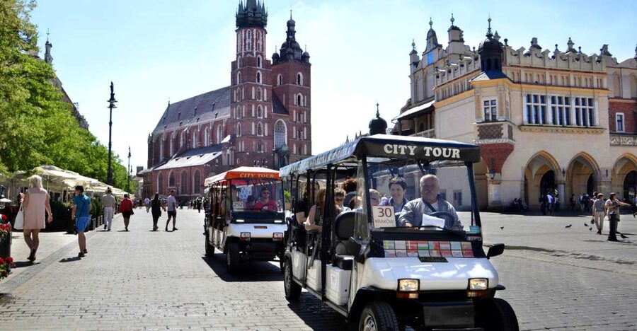 Krakow: Full Tour Regular 1.5h guided city tour by E-Cart - Through Krakow’s Old Town