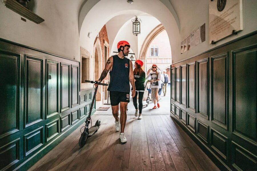 Krakow: Guided E-Scooter City Tour with Food Tastings - What the guides add to the ride