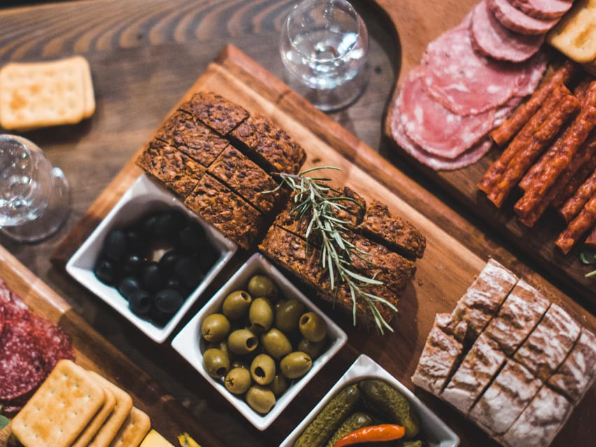Kraków: Guided Vodka Tour with Food and Drink Tastings - Following Kraków’s cobbled Old Town route