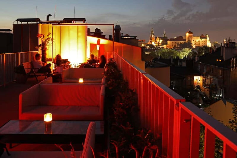 Krakow: Hidden Rooftop Bar Reservation with 1 Cocktail - Two hours with Wawel Castle in view