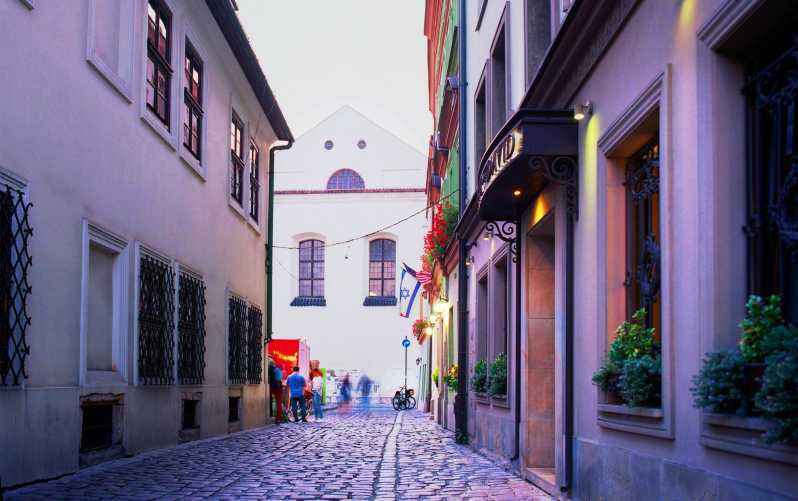 Krakow: Jewish Quarter and Former Ghetto Tour by Golf Cart - Ghetto Heroes Square and the empty chairs
