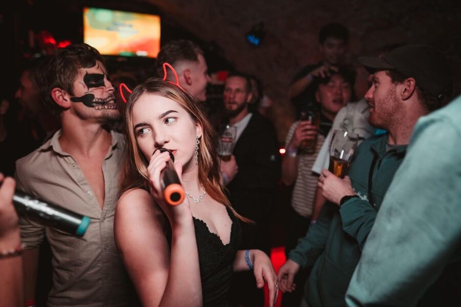 Krakow: Pub Crawl with 1 Hour of Unlimited Alcoholic Drinks - Guides who keep a large group moving