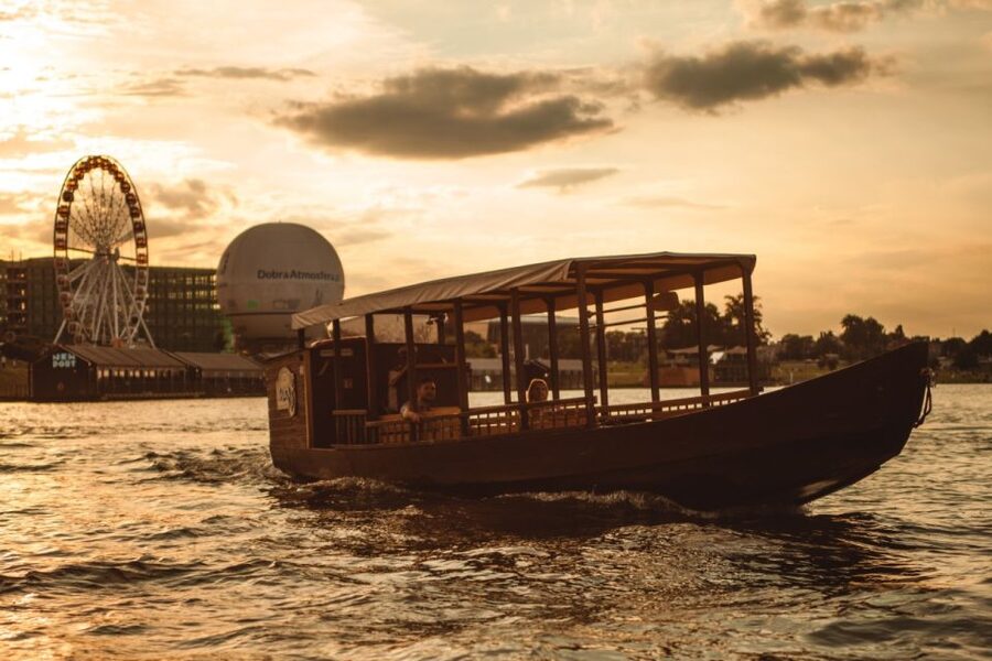 Krakow: Vistula Night Cruise by Gondola w/ Audio Commentary - Meeting the boat beside Bernatek footbridge