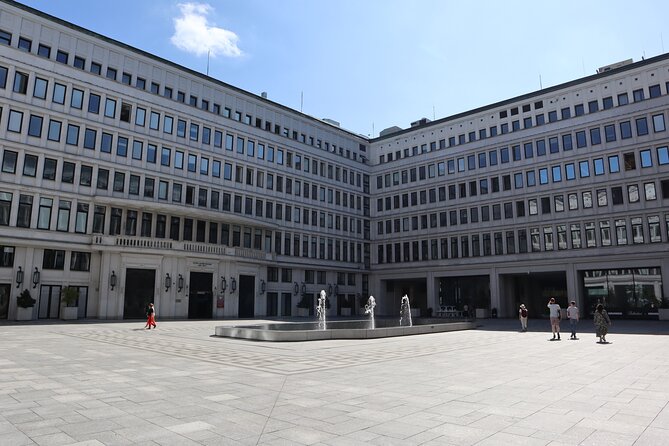 Life Behind the Iron Curtain Warsaw Walking Tour - Nowy Świat 6/12 and the former party headquarters