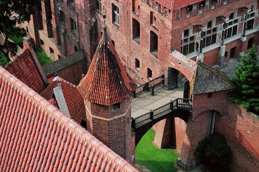 Malbork Castle Half Day Private Tour - Entering the Gothic fortress beside the Nogat