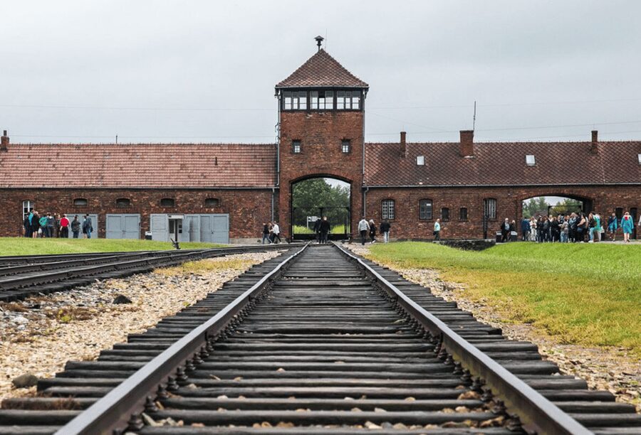 RoundTrip from Krakow to Auschwitz + Entrance Tickets - Leaving Krakow in a private-feeling van