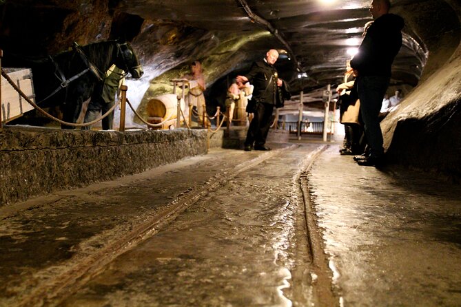 Salt Mine Wieliczka Guided Tour from Krakow - Salt carvings, statues, and the human side of the mine