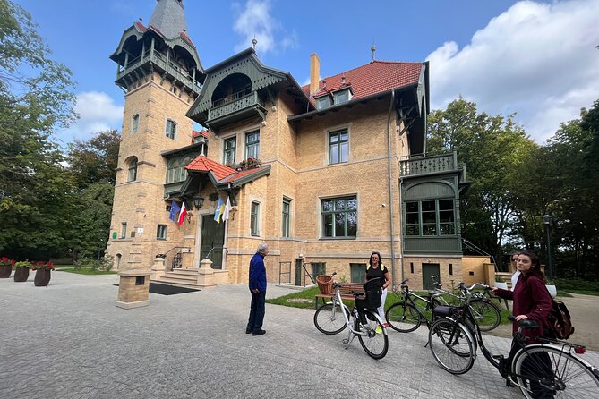 Sopot Private City Walking or Bike Tour with a local architect - The pier, changing rooms, and fishermen’s houses