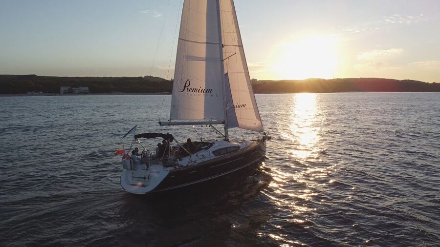 Sopot: Sunset Yacht Cruise with Welcome Drink - The crew and the chance to take the helm
