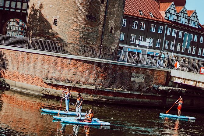 SUP Private Tour in Motlawa River - SS Soldek, a working ship turned museum