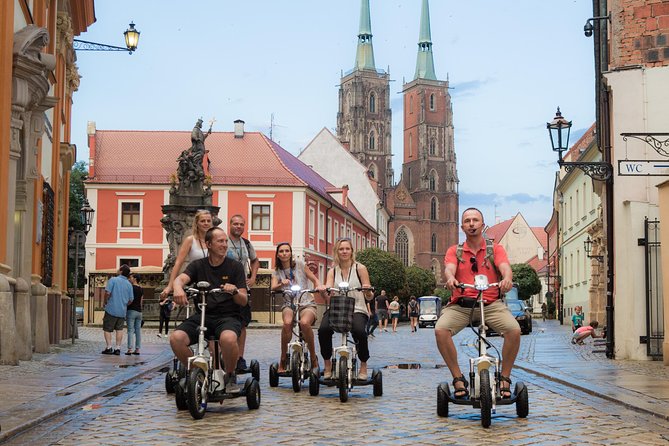 The Classic E-Scooter (3 wheeler) Tour of Wroclaw - everyday tour at 6:00 pm - City Hall and the story behind Wrocław
