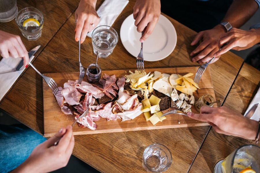 Warsaw: 4-Hour Polish Food Tour - The opening plates: cheese, starters, and Polish table habits