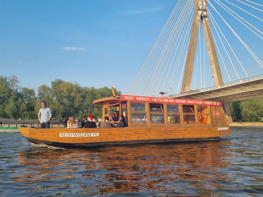 Warsaw: Evening Vistula Cruise with Welcome Drink - Warsaw’s skyline from the Vistula after sunset