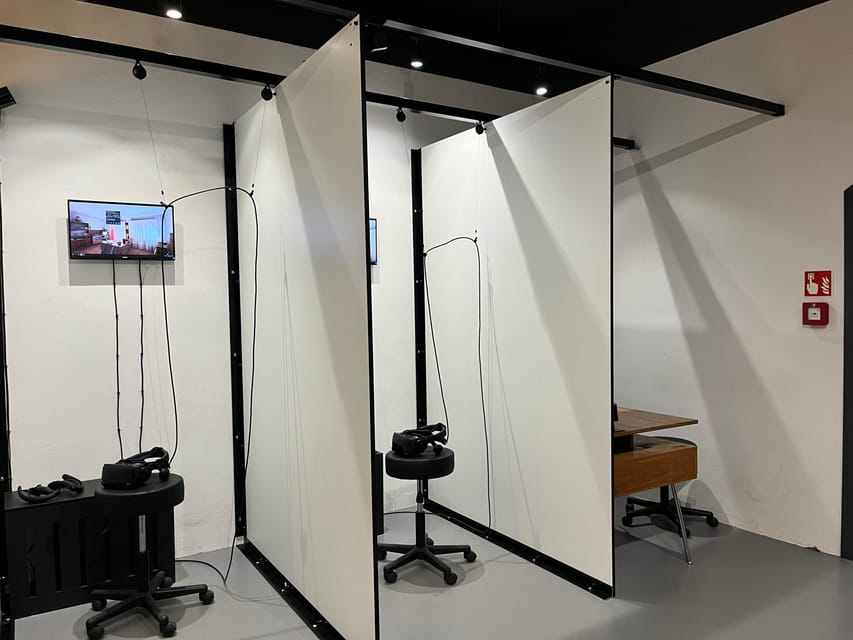 Warsaw: Guided tour of the Cold War Museum - Multimedia tables, a quiz, and a museum robot