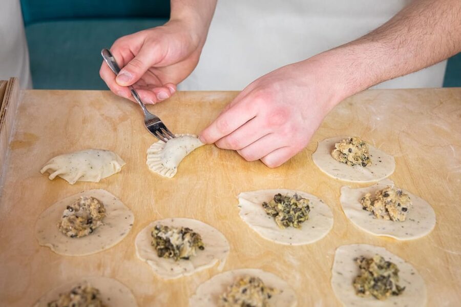 Warsaw: Polish Dumplings Cooking Class - Mixing dough and choosing your filling