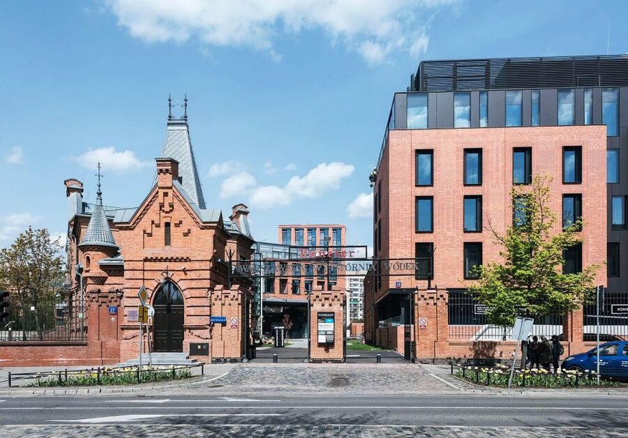 Warsaw: Praga District Tour with Vodka Museum and Tasting - Communist blocks and the Soho post-industrial zone