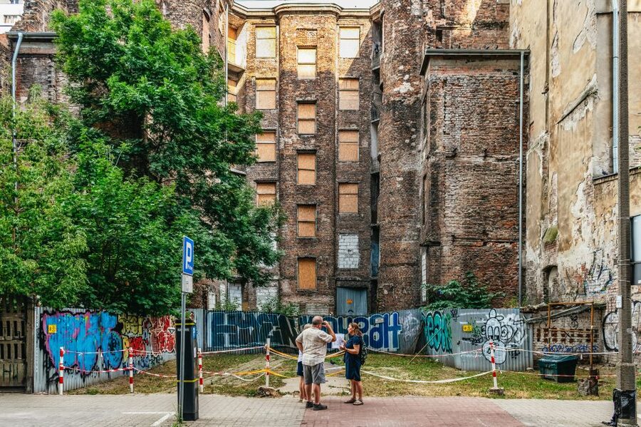 Warsaw: Warsaw Ghetto Private Walking Tour with Hotel Pickup - Seeing the wall fragments and vanished boundaries