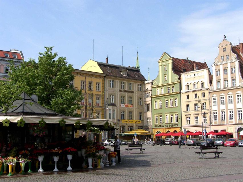 Wroclaw: 2-Hour Tour by Electric Car with a driver-guide - The return route through riverfront Wroclaw