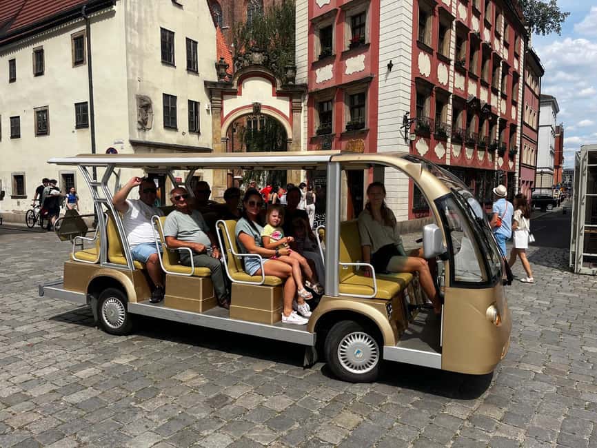 Wroclaw: City Tour Sightseeing Golf Cart Old City+Cathedral - Starting among the Old Town churches and market streets