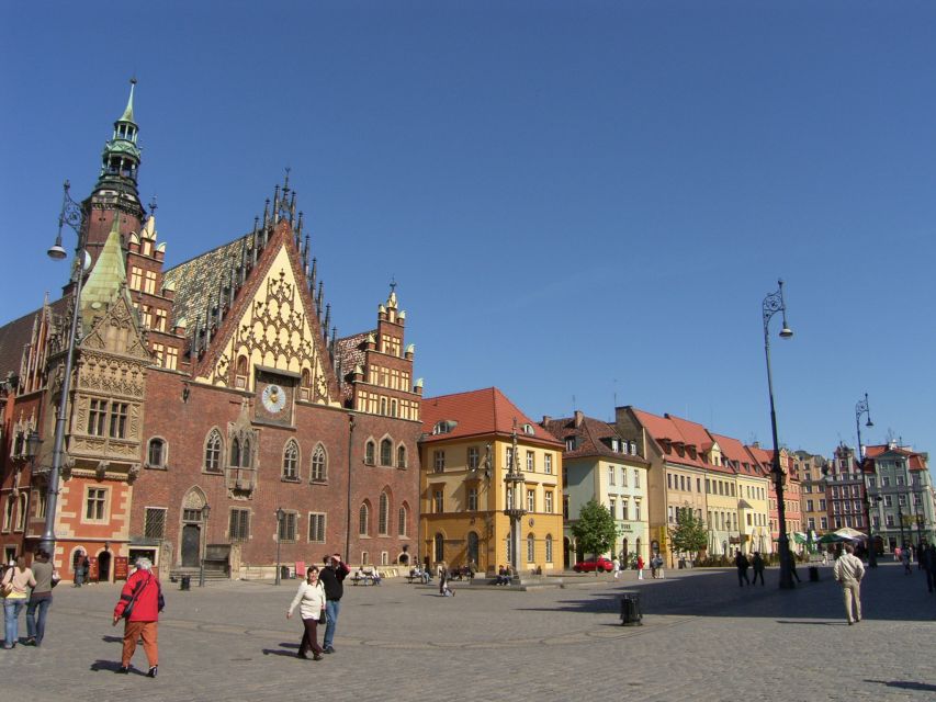 Wrocław: city walk with a professional guide and cruise - What the $167 group price really covers